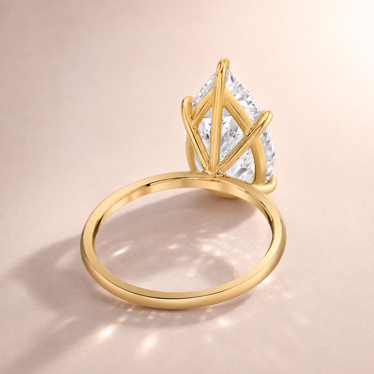 THE 14KT PEAR RING
