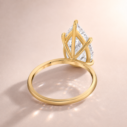 THE 14KT PEAR RING