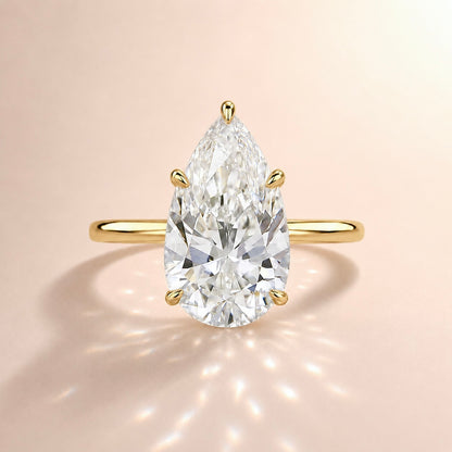 THE 14KT PEAR RING