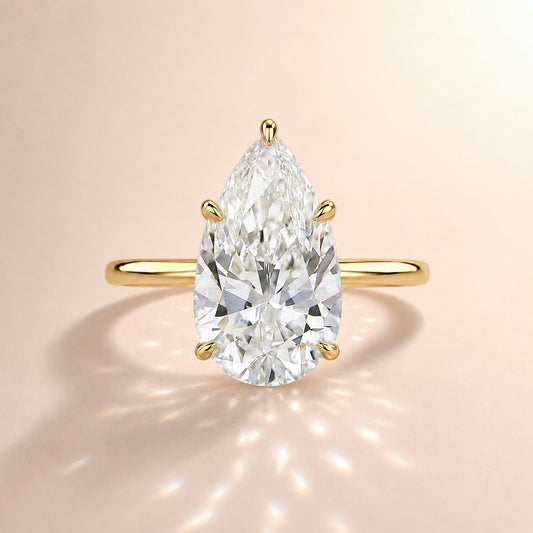 THE 14KT PEAR RING